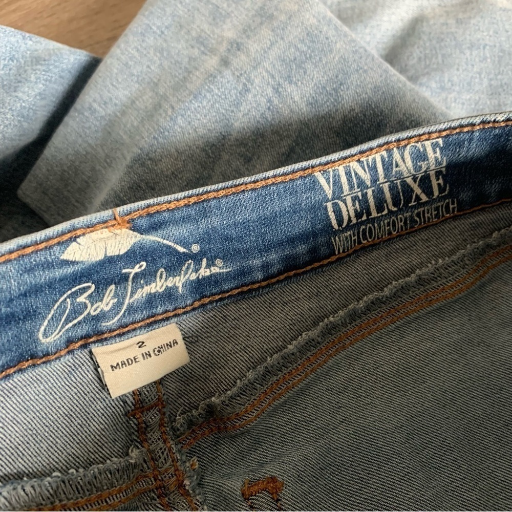 Embroidered Raw Hem Jeans - Picture 14 of 14